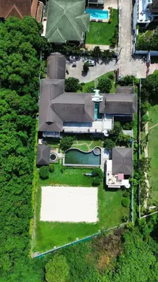 an aerial view of a house with a yard at Phu-Pha Thara Villa Phuket in Ban Saiyuan (1)