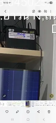a computer monitor sitting on top of a shelf at The Sea Condo Ao Nang Apartment Relax with Sea View in Ban Khlong Haeng