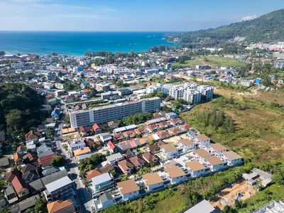 an aerial view of a city with houses at Villa Chandlers - Goldena Twin in Kamala Beach