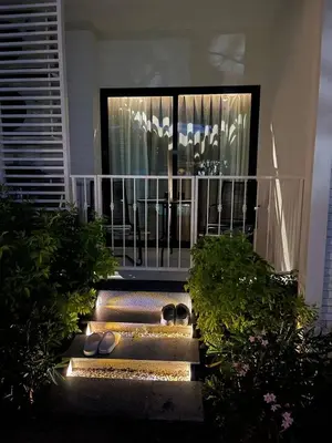 a garden with shoes in front of a window at JU3 Halo NEW ВатСaп66935B2I976 in Nai Yang Beach