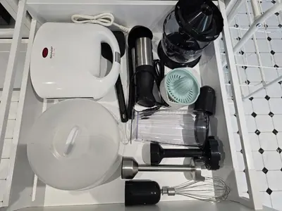 a bathroom with a toilet and utensils at TheTitleHalo1 in Phuket