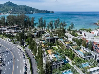 an aerial view of a city with the ocean at JSD Prime Property-Kamala Beach in Surin Beach