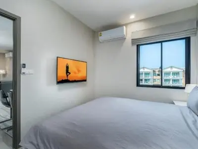 a white bedroom with a large bed and a window at А4 Title 2-bedroom 86м2 ВатСaп66935B2I976 in Nai Yang Beach