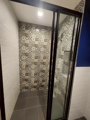 a shower with a glass door in a bathroom at The Base Central Phuket-B32YJ in Ban Rangeng