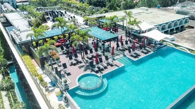 an aerial view of a pool at a resort at Beachfront Family Pool 1 BR 1 Living Patong Phuket in Patong Beach