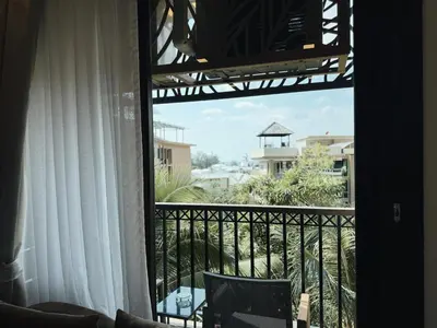 a view from a room with a balcony with a view at Proud Karon 303 in Karon Beach