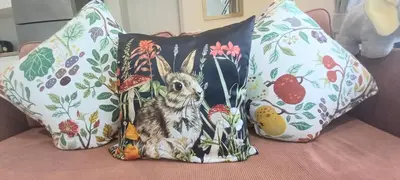 three pillows with a bunny on them on a couch at MO1 Halo 2-bedroom ВатСaп66935B2I976 in Nai Yang Beach
