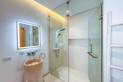 a bathroom with a glass shower and a sink at Brand-New 3BR Designer Pool Villa in Exclusive Residence LuxPride 4 L20 in Bang Tao Beach