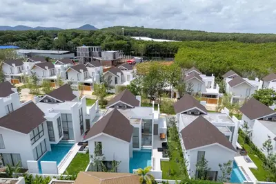 an aerial view of houses in a suburb at Brand-New 3BR Designer Pool Villa in Exclusive Residence LuxPride 4 L20 in Bang Tao Beach