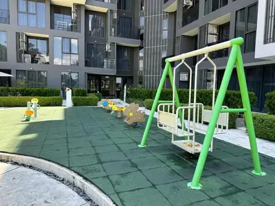 a playground in front of a apartment building at Laguna Skypark spacious 1 bedroom apart Bangtao in Laguna Phuket