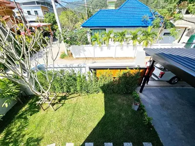 an aerial view of a yard with a house at Modern 2 Bedroom Pool Villa in Kamala in Kamala Beach