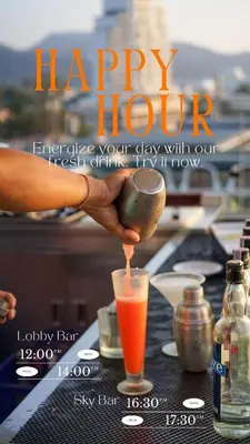 a person is making a drink on a table at Beachfront Deluxe BR Infinity Pool Patong Phuket in Patong Beach