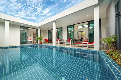 a swimming pool in the middle of a house at Unique Style & Comfort, 2BR Pool Villa DannyLys, near Nai Harn in Rawai Beach