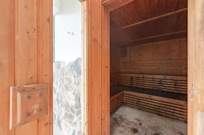 an empty room with a glass door of a wooden cage at C206 Sea-View Condo 5 Min Walk to Kata Beach in Karon Beach