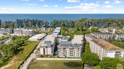 an aerial view of a city with the ocean at Pool View 1412 Elegant Wyndham Condo in Nai Thon Beach