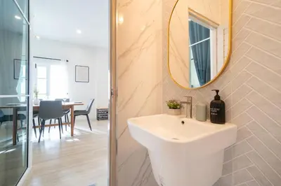 a bathroom with a sink and a mirror at 6BDR patong pool villa by Mp property in Patong Beach