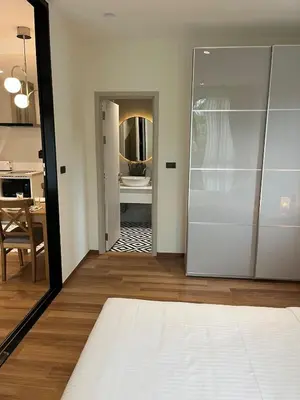 a room with a door leading to a bathroom at МЕ4 Halo NEW2 ВатСaп66935B2I976 in Nai Yang Beach