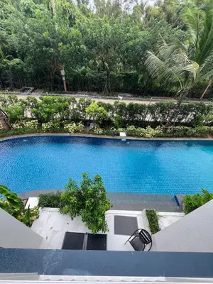 an overhead view of a large swimming pool at МЕ4 Halo NEW2 ВатСaп66935B2I976 in Nai Yang Beach