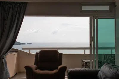 a living room with a view of the ocean at Private 2 Bedroom Seaview at Patong Phuket in Patong Beach
