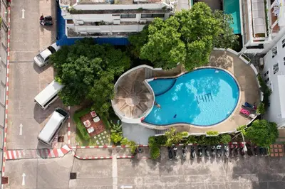 an overhead view of a swimming pool at a resort at Private 2 Bedroom Seaview at Patong Phuket in Patong Beach