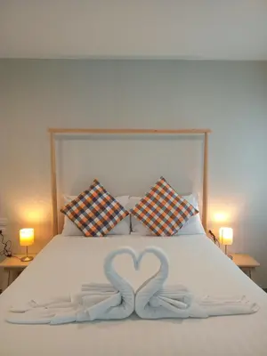 two swans forming a heart on a bed at В11 Title Naiyang Ватсап669З5В2I976 in Nai Yang Beach
