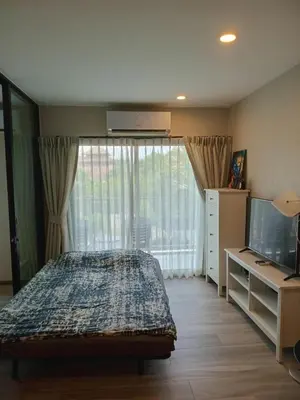 a bedroom with a bed and a large window at В11 Title Naiyang Ватсап669З5В2I976 in Nai Yang Beach
