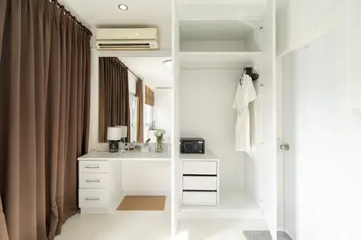a bathroom with a sink and a mirror at Laguna Townhouse with private pool and your own gym near Bangtao Beach in Laguna Phuket