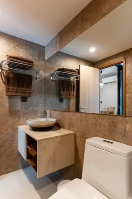 a bathroom with a sink and a toilet at Cozy apartment in Title V 400 m to Rawai Beach in Rawai Beach