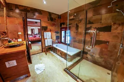 a bathroom with a shower and a tub and a sink at Luxury 8 - 9 Bedroom Villa With 2 Pools in Kamala Beach