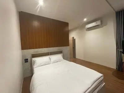 a bedroom with a white bed in a room at Modern ZEN Vibe 3BR Pool Villa Phuket in Ban Tha Khreng