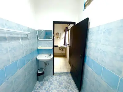 a bathroom with a sink and a toilet in it at Patong Canal Villa 105 in Patong Beach