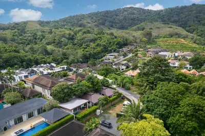 an aerial view of a small town with a mountain at Oxavia Garden Oasis B3 in Nai Harn with Jaccuzzi in Rawai Beach