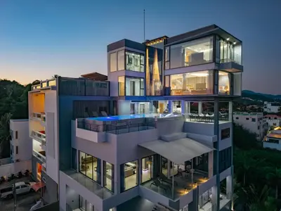 an image of a building at dusk at Luxury 6BR Seaview Statement Villa - Villa Legend in Ban Saiyuan (1)