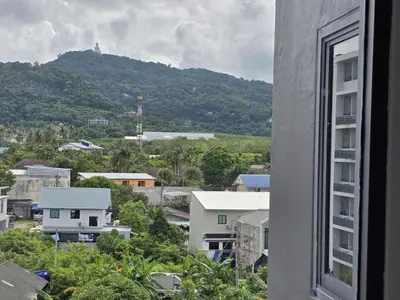 a view from a window of a city at Sleek Corner 1 Bed Apt T1-607 in Chalong