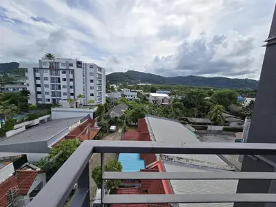 a view of a city from the balcony of a building at Sleek Corner 1 Bed Apt T1-607 in Chalong