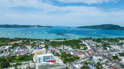 an aerial view of a city and a body of water at Blue Edge Studio T3-527 in Chalong