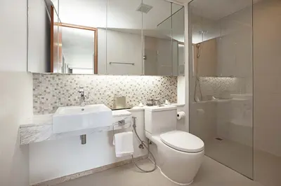a bathroom with a toilet and a sink and a shower at Stunning Seaview Escape - Modern and Elegant in Kata Beach