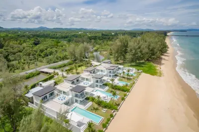 an aerial view of a large house on the beach at Baan Kloi II in Ban Na Tai