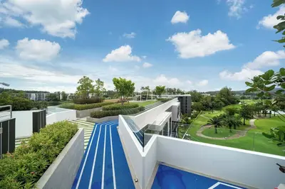 an aerial view of a house with a swimming pool at Fairway Escape - Golf View 1BR with Balcony in Laguna in Laguna Phuket