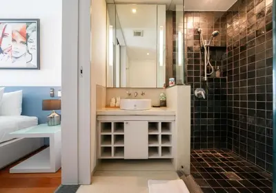 a bathroom with a sink and a shower at JSD Prime Property-Surin Beach in Surin Beach