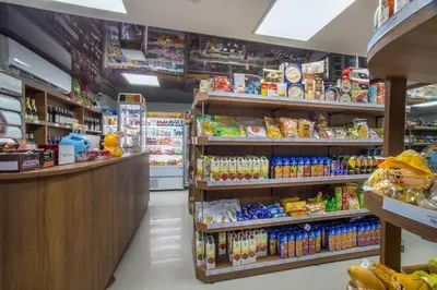 a grocery store aisle with food and drinks at ARIA Condo 1BR Pool View NBC Nai Harn in Phuket Town