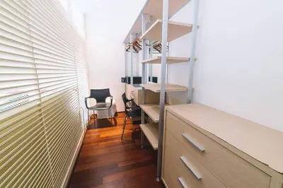 an office with a desk and a chair in a room at Patong Condotel Penthouse 2 bedroom in Patong Beach