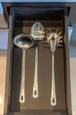three silver spoons in a black box at Suite Ruse 1BR Rooftop Pool ViewCitygate Kamala in Kamala Beach