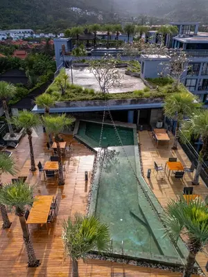 an overhead view of a courtyard with a fountain at Suite Ruse 1BR Rooftop Pool ViewCitygate Kamala in Kamala Beach