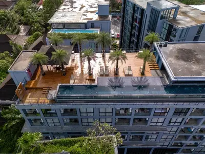 an overhead view of a building with a swimming pool at Luxury 1BR Resort Retreat by IBG Property P514 in Kamala Beach
