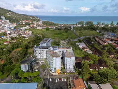 an aerial view of a city with the ocean at Luxury 1BR Resort Retreat by IBG Property P514 in Kamala Beach