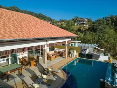an aerial view of a house with a swimming pool at Karon Bliss Sea View Villa with Private Pool in Karon Beach