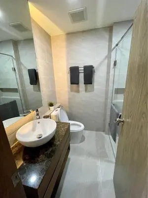 a bathroom with a sink and a toilet and a shower at Sea Breeze 2 Bedrooms Rawai Naiharn Beach in Rawai Beach