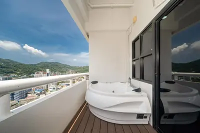 a balcony with two sinks on a cruise ship at Apartment with jacuzzi - Patong Tower by lofty in Patong Beach