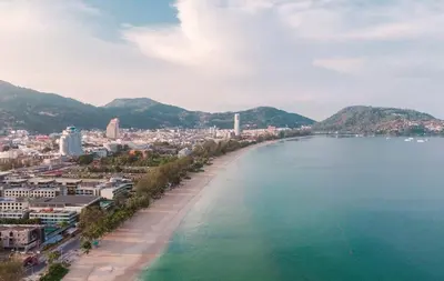 a view of a beach with a city and the ocean at Apartment with jacuzzi - Patong Tower by lofty in Patong Beach